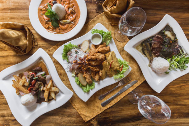 istock Peruvian food, ceviche, lomo saltado, piqueo on an elegant restaurant table 1139804499