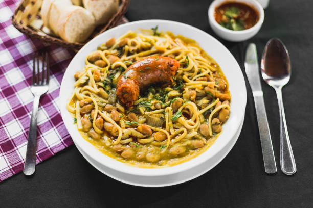 Chilean beans with rustic sausage on a typical chilean table