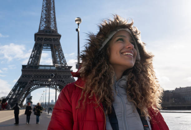 istock Happy woman sightseeing in Paris and visiting the Eiffel Tower 1139804975