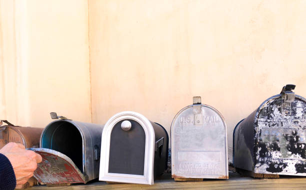 istock Line of Classic Old Rural US Mailboxes 1139807063