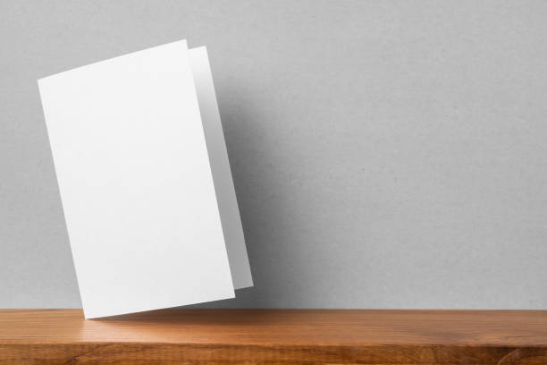 istock front view of greeting card on bookshelf and grey wall 1139807285