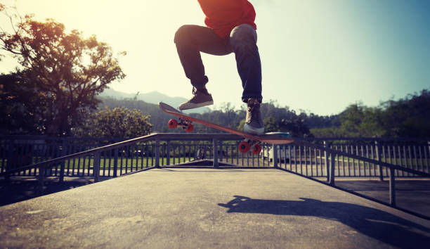 istock Skateboarder skateboarding at skatepark ramp 1139810510