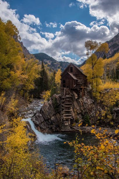 istock Old power generator mill Aspen area 4x4 road through aspen trees 1139810601