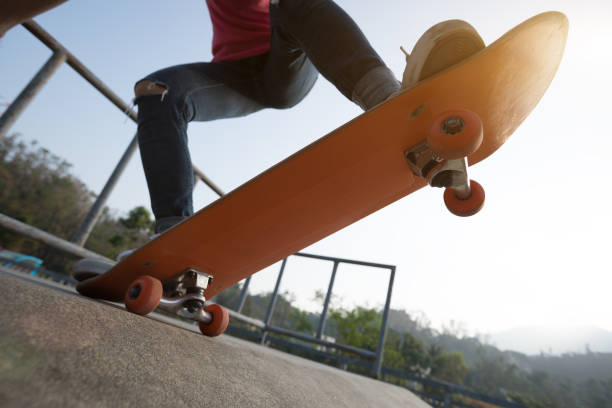 istock Skateboarder skateboarding at skatepark ramp 1139811238