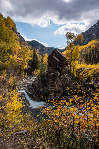 istock Old power generator mill Aspen area 4x4 road through aspen trees 1139811266