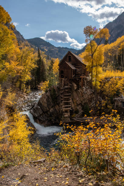 istock Old power generator mill Aspen area 4x4 road through aspen trees 1139812355