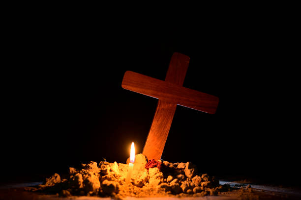 istock Jesus cross in cemetery 1139812414
