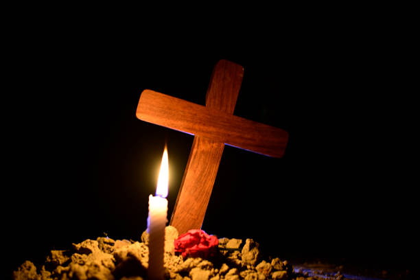 istock Jesus cross in cemetery 1139812527