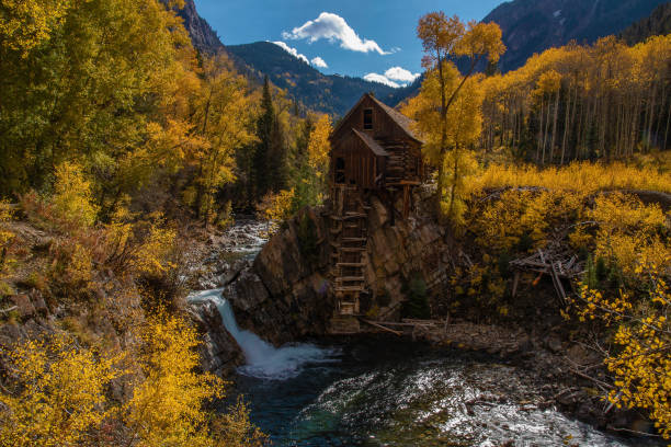 istock Old power generator mill Aspen area 4x4 road through aspen trees 1139812535