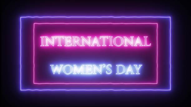 cartello al neon 'giornata internazionale della donna' - equal opportunity flash foto e immagini stock
