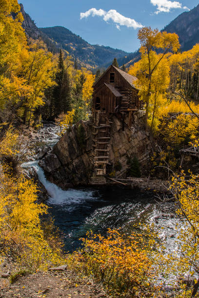 istock Old power generator mill Aspen area 4x4 road through aspen trees 1139813679