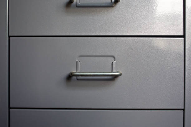 istock Filing cabinet with closed drawer, Grey silver metal colour, Administration and storage concept, closeup & Macro shot 1139814935