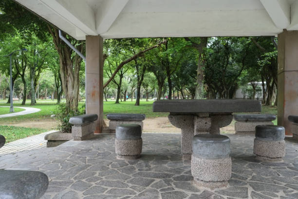 istock Stone table and chair in the park. 1139824927