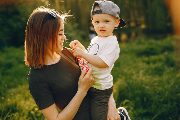 istock Mother with son in a summer park 1139826902