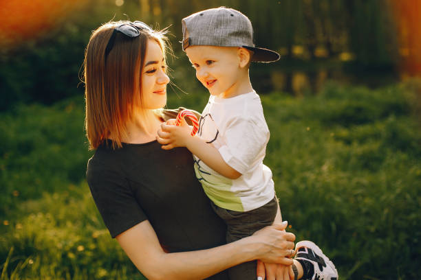istock Mother with son in a summer park 1139826918