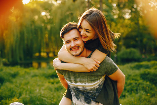istock Couple in a summer park 1139826971