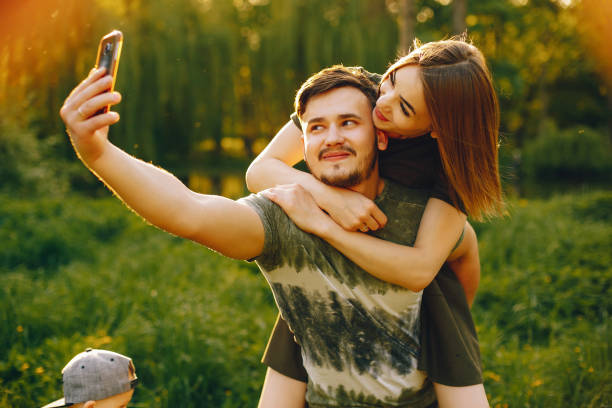 istock Couple in a summer park 1139827062