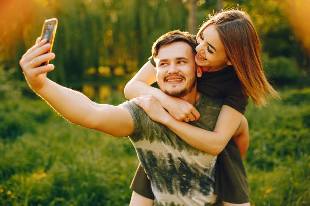 istock Couple in a summer park 1139827074
