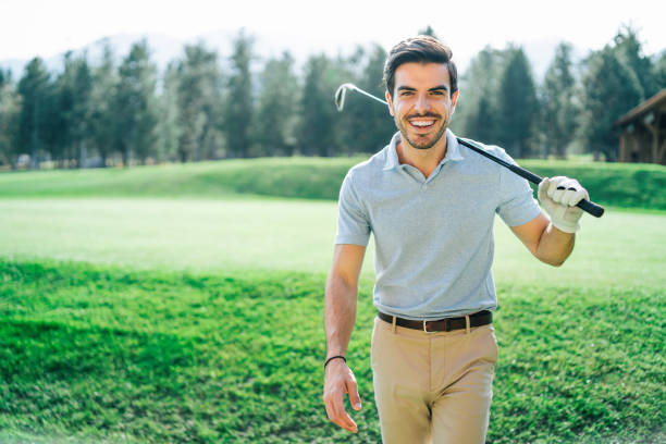 istock Male golfer standing on golf course 1139827432