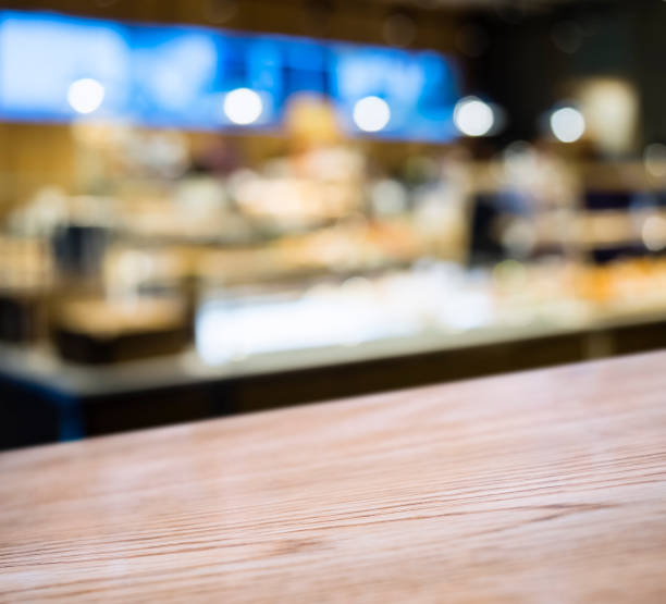 istock Table top counter Blur bar counter Coffee shop cafe interior background 1139836530