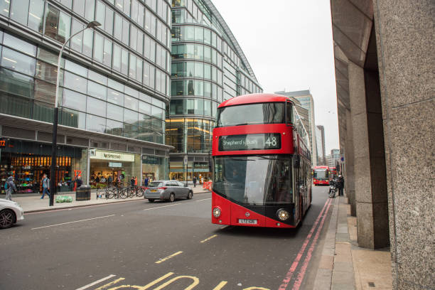 London, UK - March 22, 2019: Iconic red London double decker bus transporting people on the streets of Westminster city