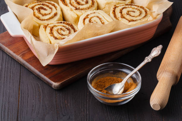 cinnamon buns on a baking sheet