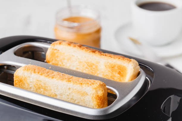 istock Close up of two wheat breads baked by using a toaster 1139842987