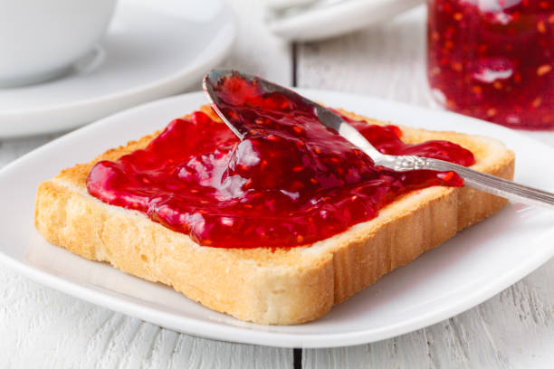 istock Delicious toast with sweet jam served for breakfast on table 1139844774
