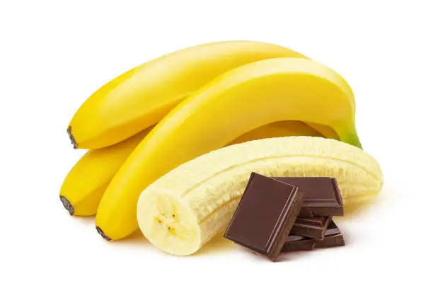 Photo of Banana and chocolate isolated on white background