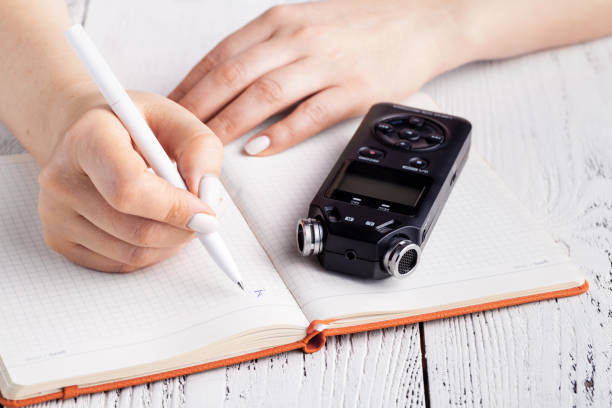 istock recording lecture on voice recorder instead of writing 1139846458