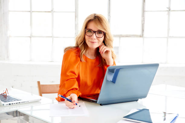 istock Businesswoman working on notebook in the office 1139847313