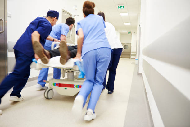 istock Rear view of doctors running for the surgery 1139847646