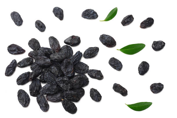 istock black raisins isolated on white background. top view 1139848747