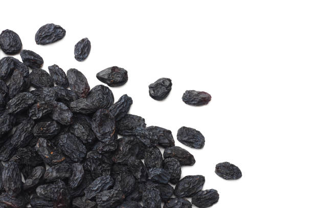 istock black raisins isolated on white background. top view 1139848748