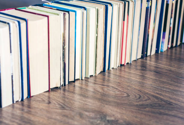 istock Stack of books education background, many books piles with copy space for text 1139858039