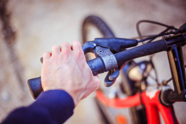 istock Bicycle handlebar and breaks, bike repair, blurred background 1139858240