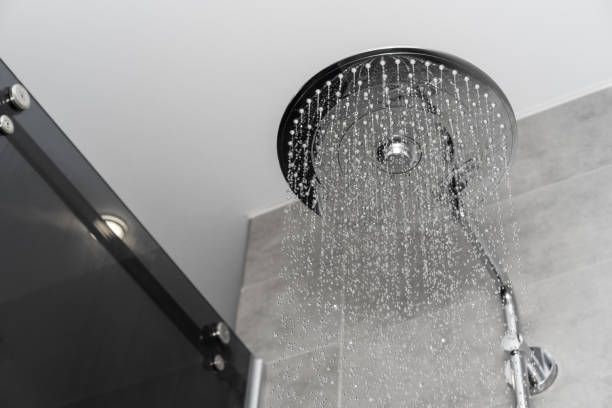 istock Rain Shower turned on, ceiling shower head closeup in the shower stall 1139861341
