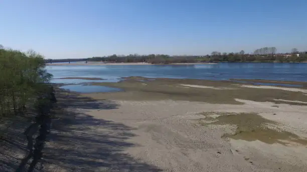 River Po - Pavia - Lombardia - Italy - March 26, 2019. The dry Po river bank at its lowest water level.