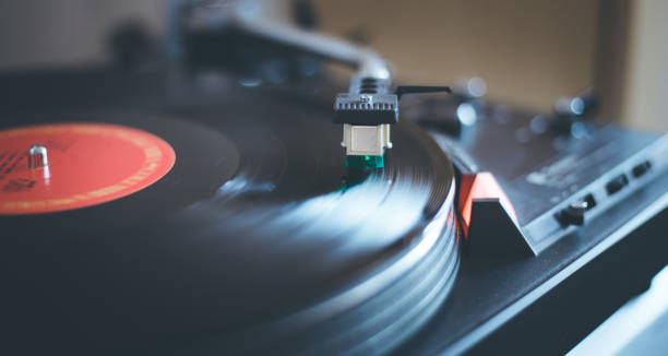 istock Playing retro music: Professional turnable audio vinyl record music player 1139861507