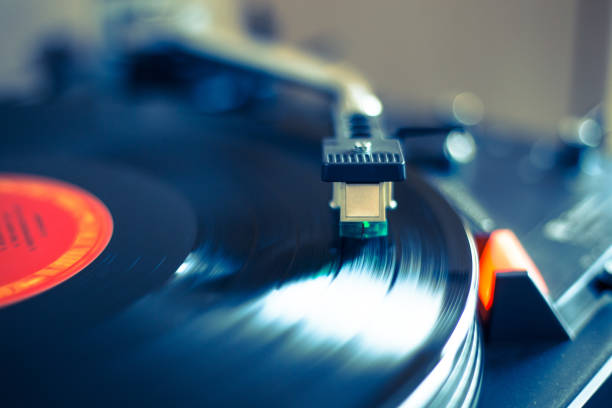 istock Playing retro music: Professional turnable audio vinyl record music player 1139861521