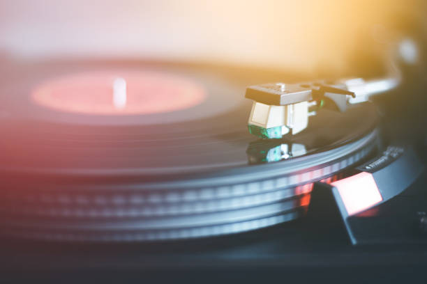 istock Playing retro music: Professional turnable audio vinyl record music player. 1139861564
