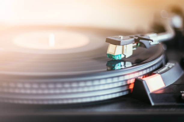 istock Playing retro music: Professional turnable audio vinyl record music player. 1139861654
