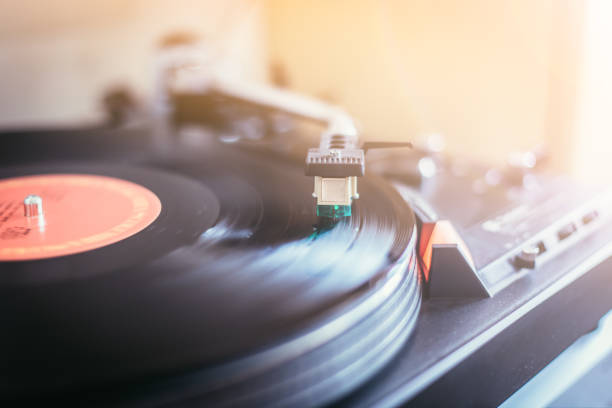 istock Playing retro music: Professional turnable audio vinyl record music player. 1139861679