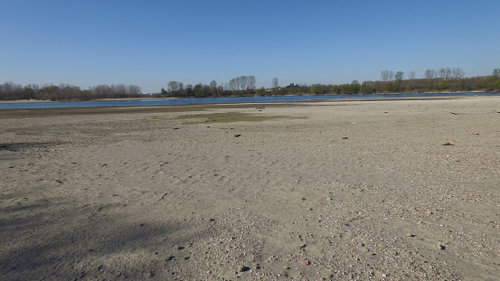 River Po - Pavia - Lombardia - Italy - March 26, 2019. The dry Po river bank at its lowest water level.