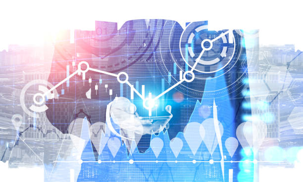istock Businessman holding smartphone, graphs and hud 1139861894