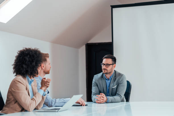 istock Conference meeting in bright office. 1139864206
