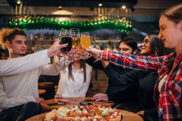 istock Friends having a toast in pub 1139866623