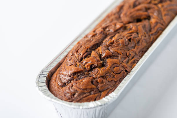 istock Delicious chocolate banana cake on white background. Selective focus 1139868106