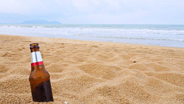 Beer bottle on beach