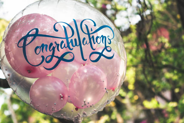 istock Transparent round balloon inserted with small pink balloons for greeting cerebration 1139869618